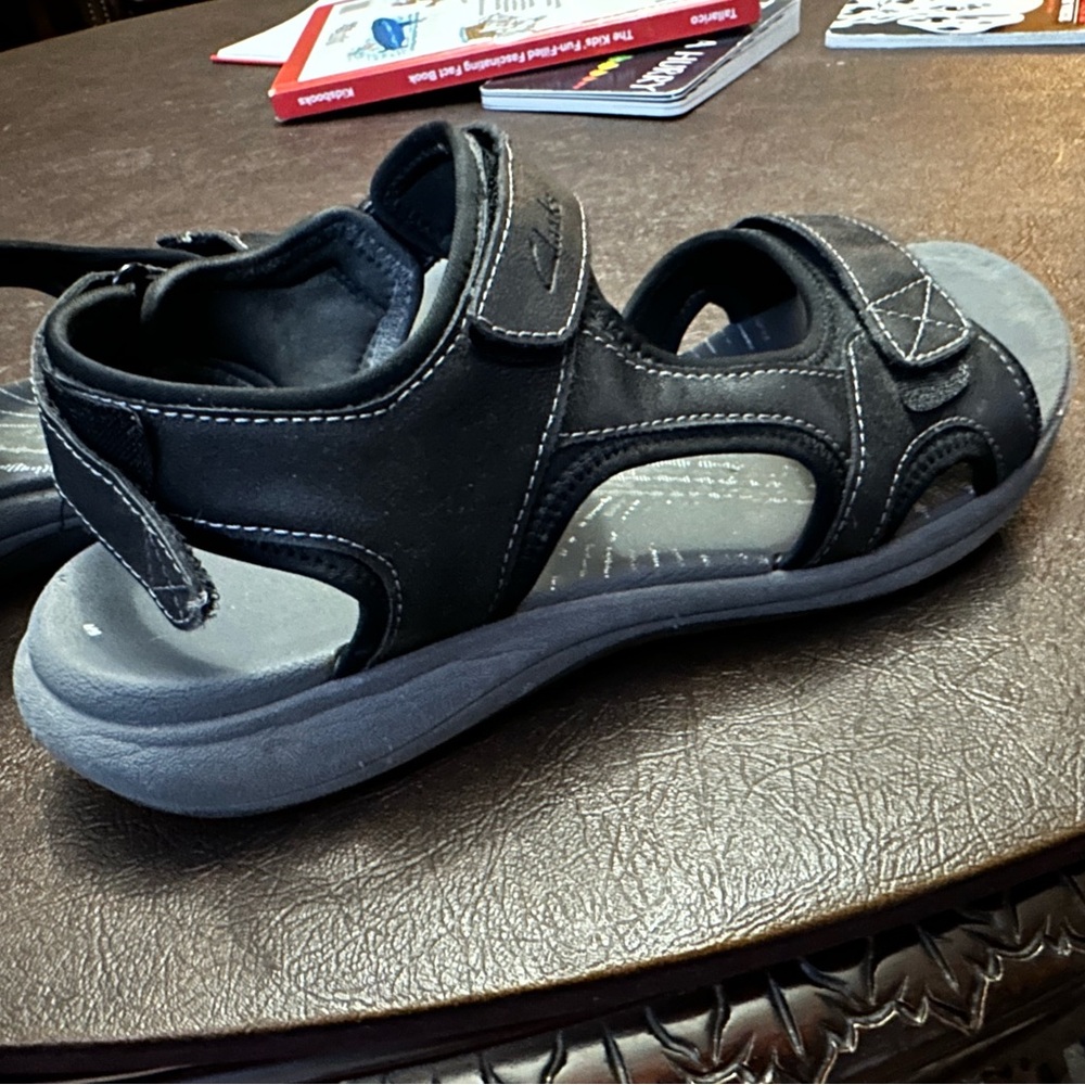 Women’s black Clark sandals